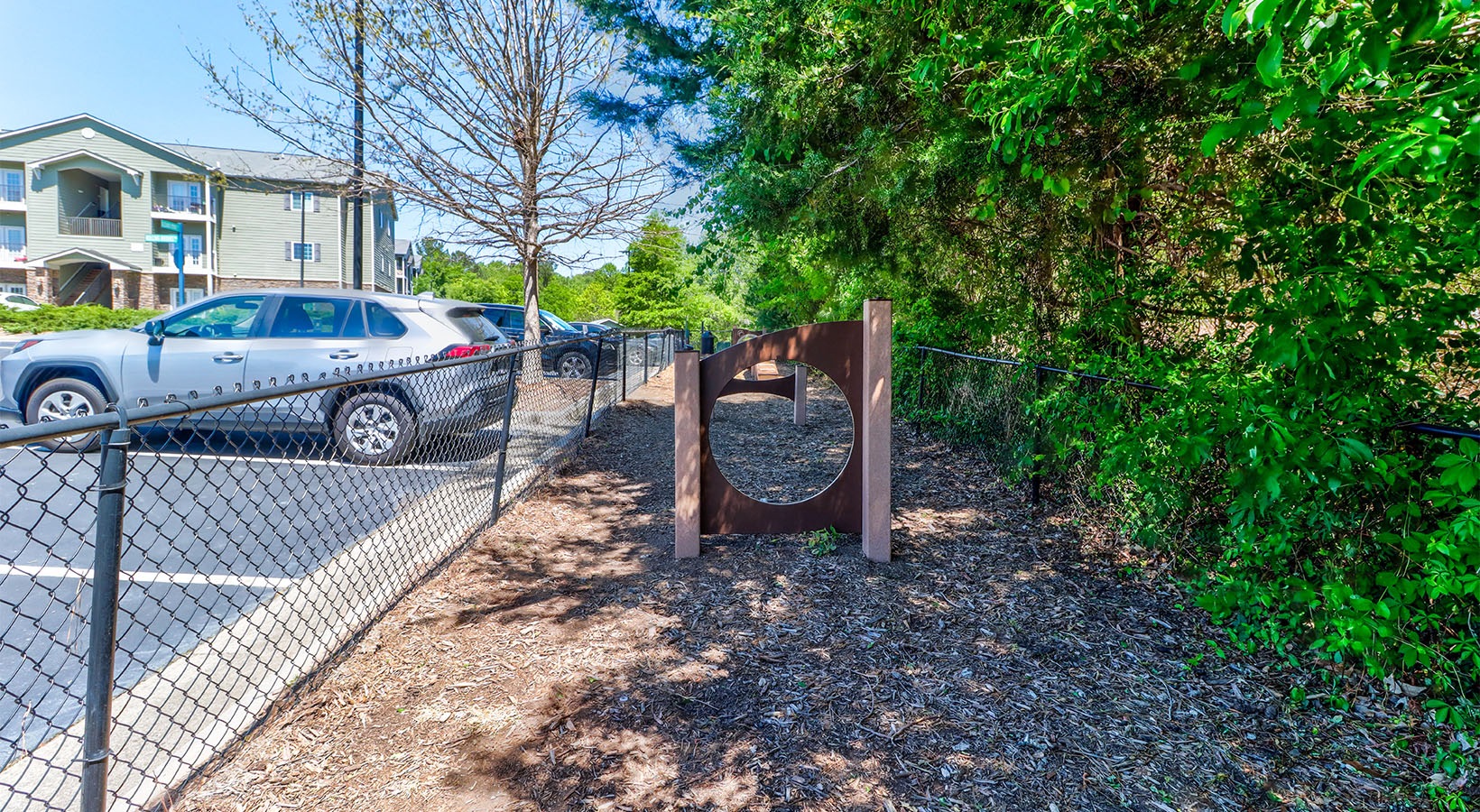 a dog park with run at The Pointe at Heritage in Wake Forest, NC