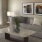 Living Room With Access To Balcony At The Pointe At Heritage Apartments in Wake Forest, NC