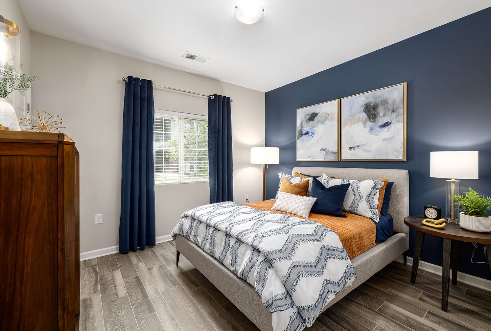 furnished bedroom with window